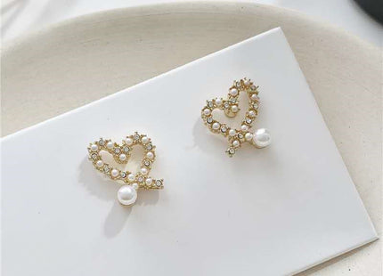 Irregular Hollow Heart Pearl Earrings