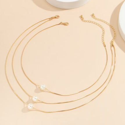 Multi-layer Pearl Snake Bone Chain Necklace - FASHION SHEGOODS LLC