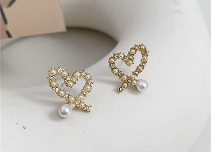 Irregular Hollow Heart Pearl Earrings