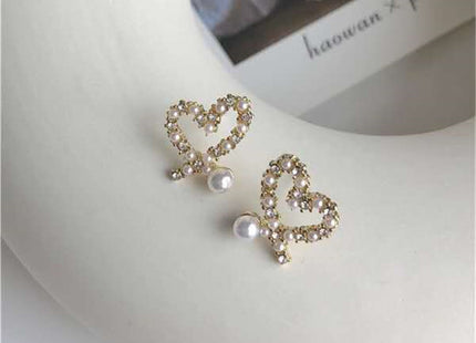 Irregular Hollow Heart Pearl Earrings