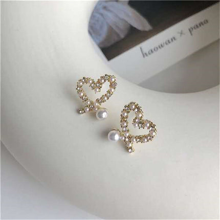 Irregular Hollow Heart Pearl Earrings