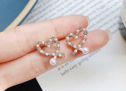 Irregular Hollow Heart Pearl Earrings