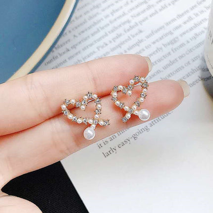 Irregular Hollow Heart Pearl Earrings