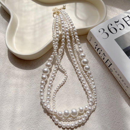 Multilayer Strand Simulated Pearl Statement Necklace - FASHION SHEGOODS LLC