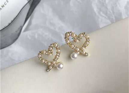 Irregular Hollow Heart Pearl Earrings