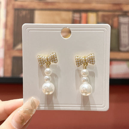 Long Tassel Pearl Bow Earrings - FASHION SHEGOODS LLC