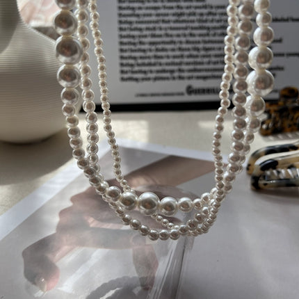 Multilayer Strand Simulated Pearl Statement Necklace - FASHION SHEGOODS LLC