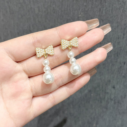 Long Tassel Pearl Bow Earrings - FASHION SHEGOODS LLC