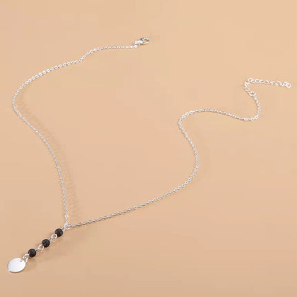 Long Disc Pendant Necklace