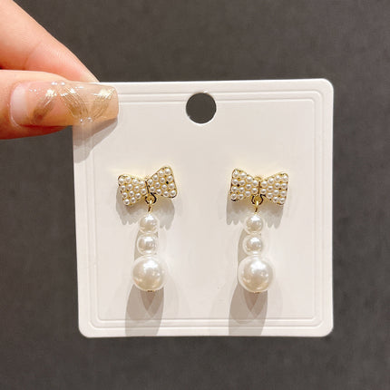 Long Tassel Pearl Bow Earrings - FASHION SHEGOODS LLC